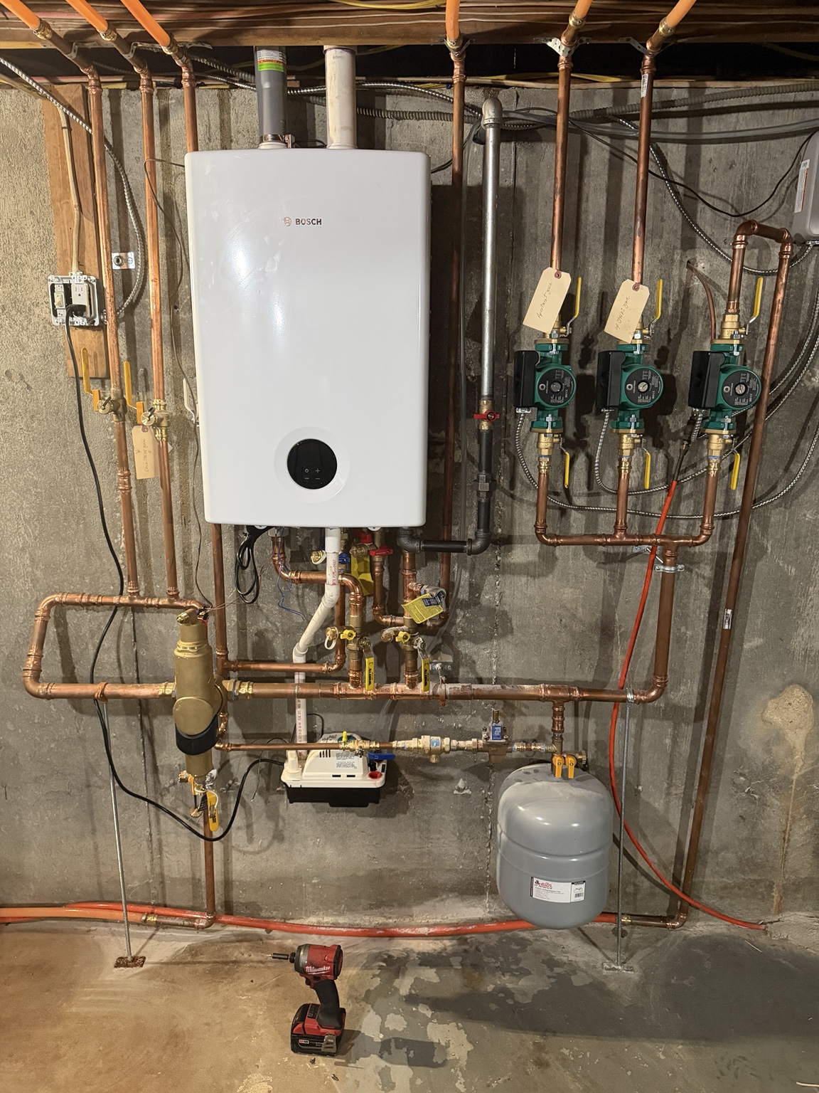 High-efficiency boiler and copper piping installation